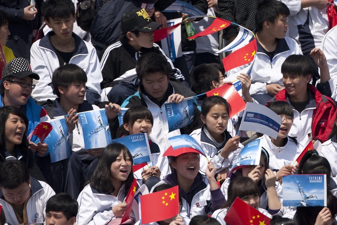 Chinese school children enjoying the racing on the first day in Qingdao - Act 2, Day 1, Extreme Sailing Series 2012 &copy; Lloyd Images http://lloydimagesgallery.photoshelter.com/